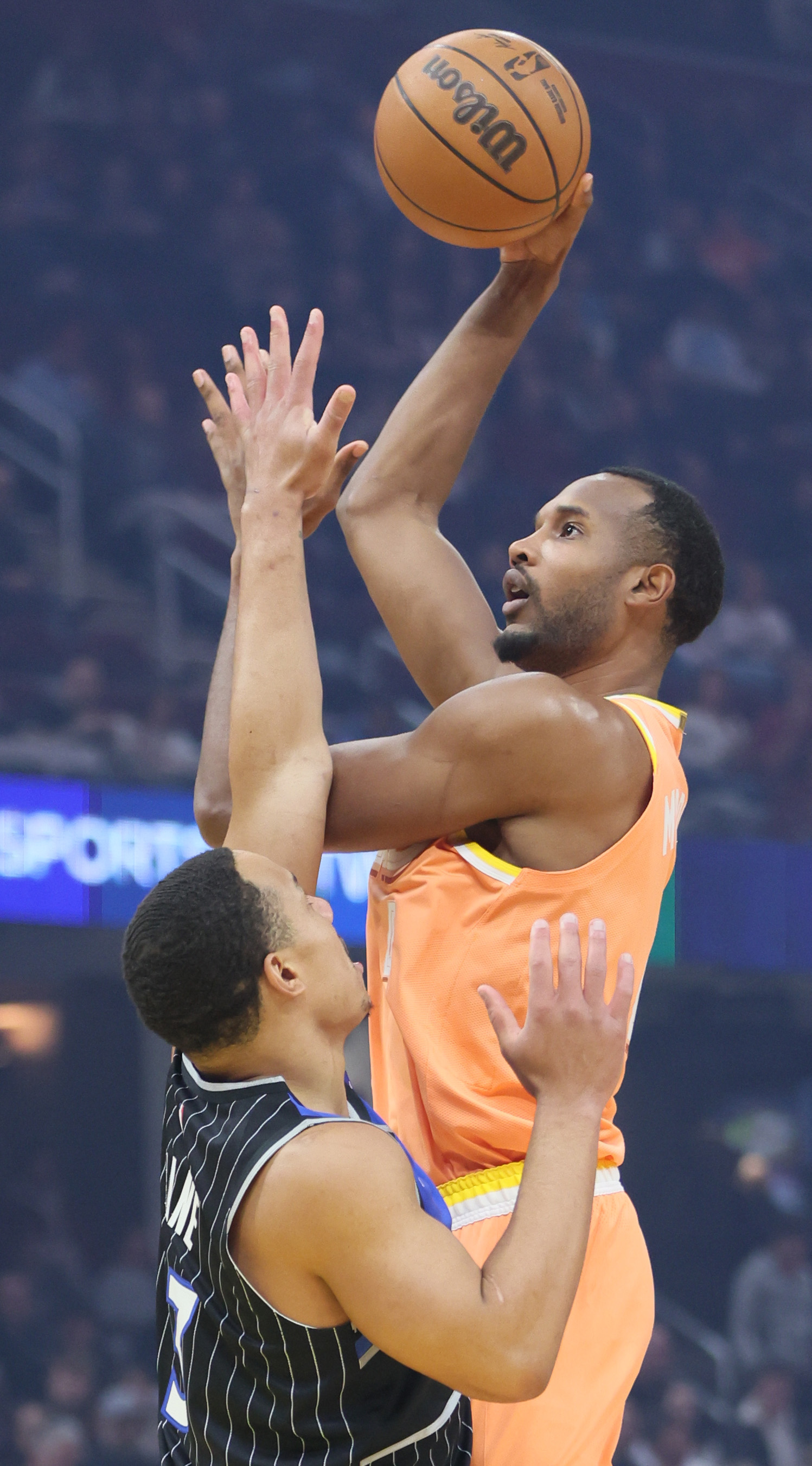 Cleveland Cavaliers center Evan Mobley takes a shot attempt guarded by Orlando Magic guard Desmond Bane in the first half at Rocket Arena. 