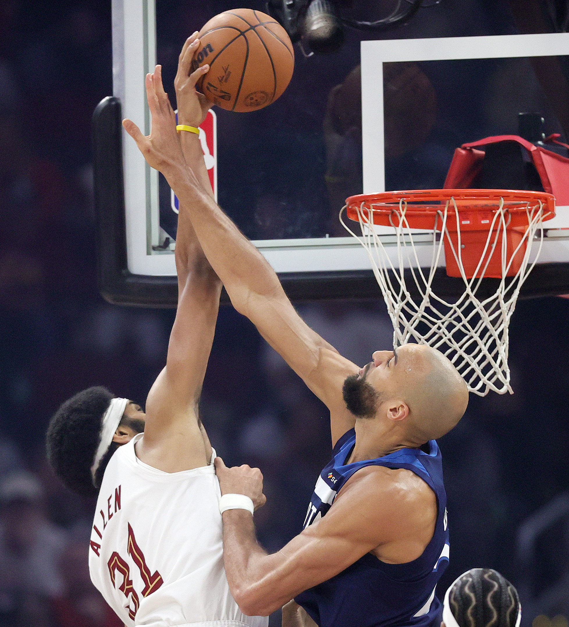 Cleveland Cavaliers center Jarrett Allen (L) goes for the dunk guarded by Minnesota Timberwolves center Rudy Gobert in the first half at Rocket Arena. 