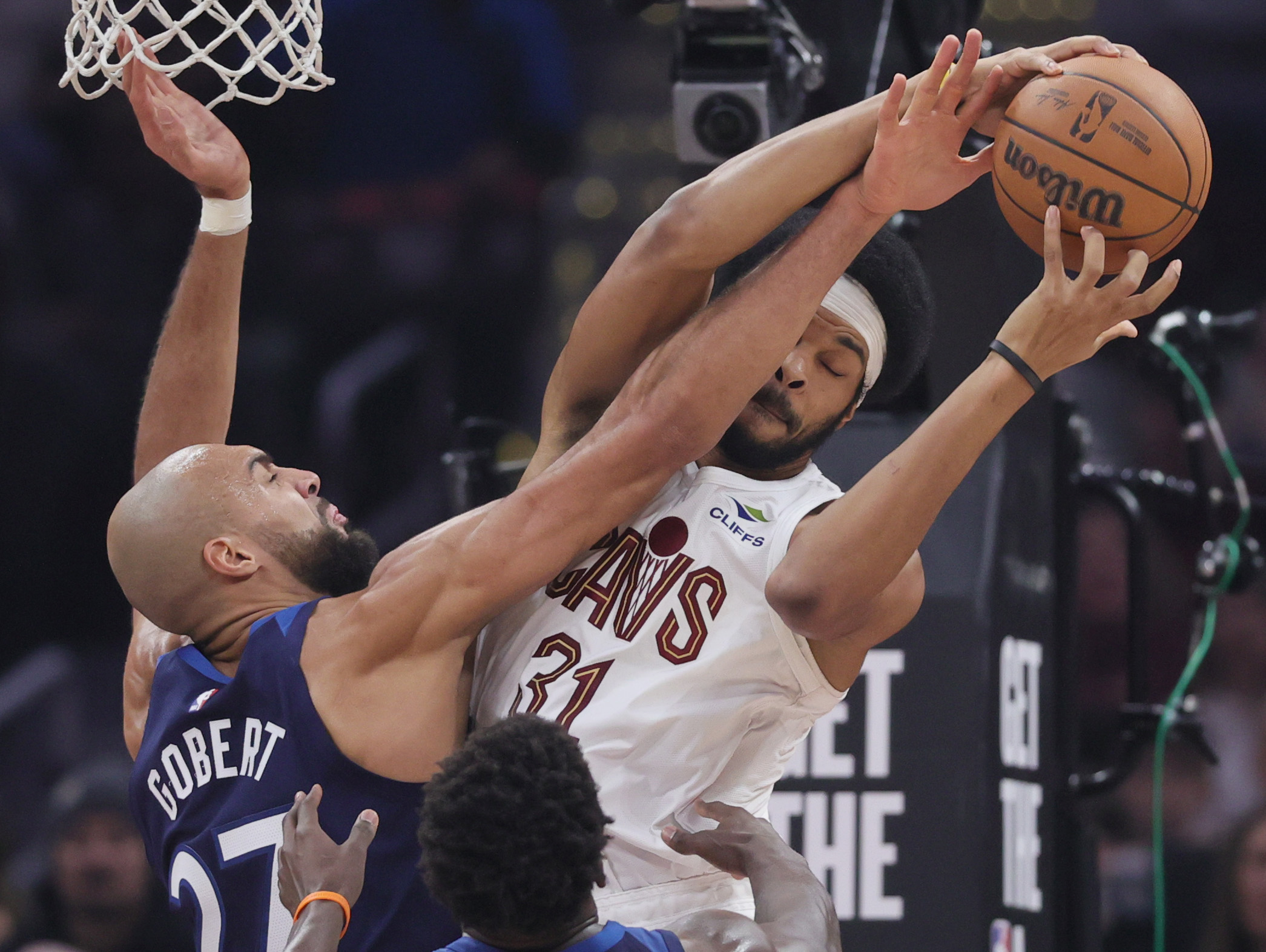 Cleveland Cavaliers center Jarrett Allen (R) and Minnesota Timberwolves center Rudy Gobert battle for possession of a rebound in the first half at Rocket Arena. 