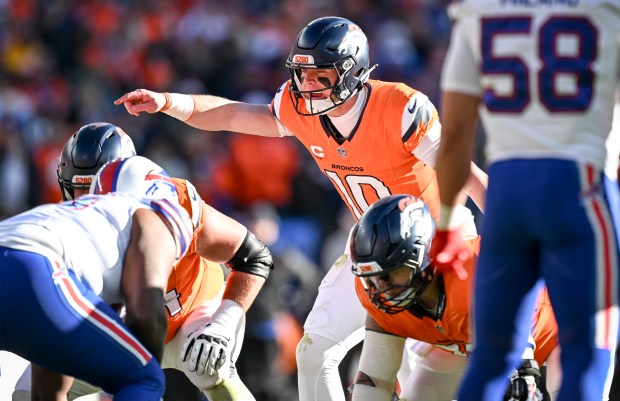 DENVER , CO - JANUARY 17: Bo Nix (10) of the Denver Broncos gives instructions to his line during the first quarter against the Buffalo Bills at Empower Field at Mile High in Denver, Colorado on Saturday, January 17, 2026. (Photo by AAron Ontiveroz/The Denver Post)