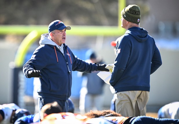 CENTENNIAL , CO - JANUARY 22: Head coach Sean Payton of the Denver Broncos speaks to offensive coordinator Joe Lombardi during practice at the Broncos Park in Centennial, Colorado on Thursday, January 22, 2026. (Photo by AAron Ontiveroz/The Denver Post)