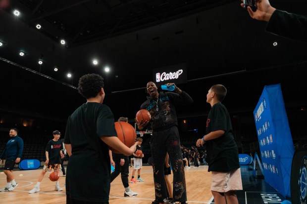 Magic Hall of Famer Dwight Howard interacts with local youth at an NBA Social Responsibility clinic in Berlin, Germany on Wednesday. (NBAE/Getty Images)