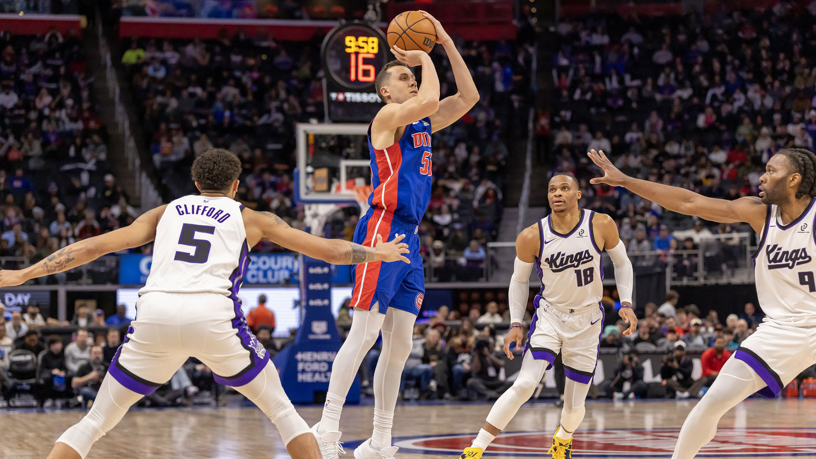 Detroit Pistons forward Duncan Robinson (55) shoots the ball against the Sacramento Kings during the during the second half at Little Caesars Arena.