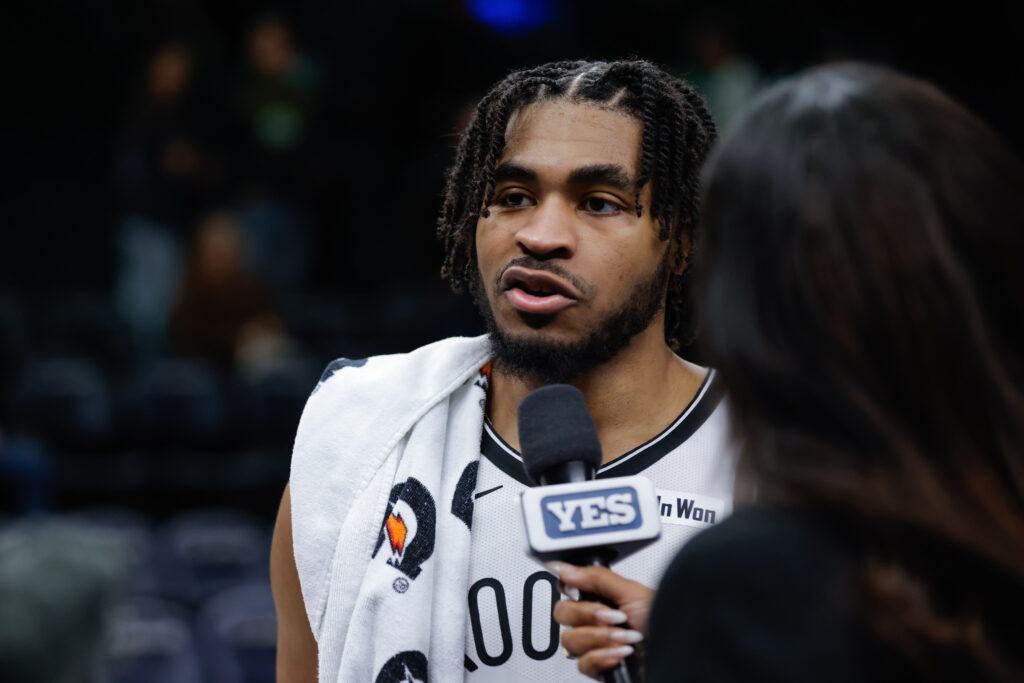 Brooklyn Nets guard Cam Thomas is interviewed after an NBA basketball game against the Minnesota Timberwolves, Saturday, Dec. 27, 2025, in Minneapolis. (AP Photo/Bailey Hillesheim)
