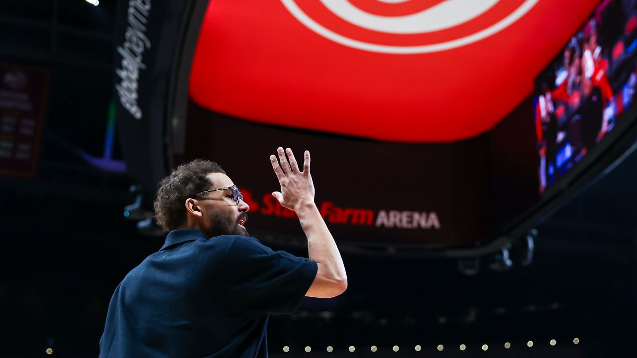 Atlanta Hawks guard Trae Young reacts during the second half of an NBA basketball game against the New Orleans Pelicans, Wednesday, Jan. 7, 2026, in Atlanta. (AP Photo/Colin Hubbard)