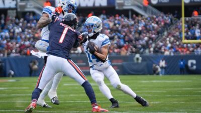 Detroit Lions wide receiver Amon-Ra St. Brown (14) attempts to get past Bears defense at Soldier Field during a game against the Chicago Bears at in Chicago, Ill., on Sunday, Dec. 22, 2024. Photo: Audrey Richardson / USA TODAY NETWORK via Imagn Images