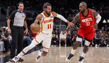 Oct 16, 2025; Atlanta, Georgia, USA; Atlanta Hawks guard Trae Young (11) dribbles against Houston Rockets forward Jeff Green (32) during the first half at State Farm Arena. Mandatory Credit: Dale Zanine-Imagn Images