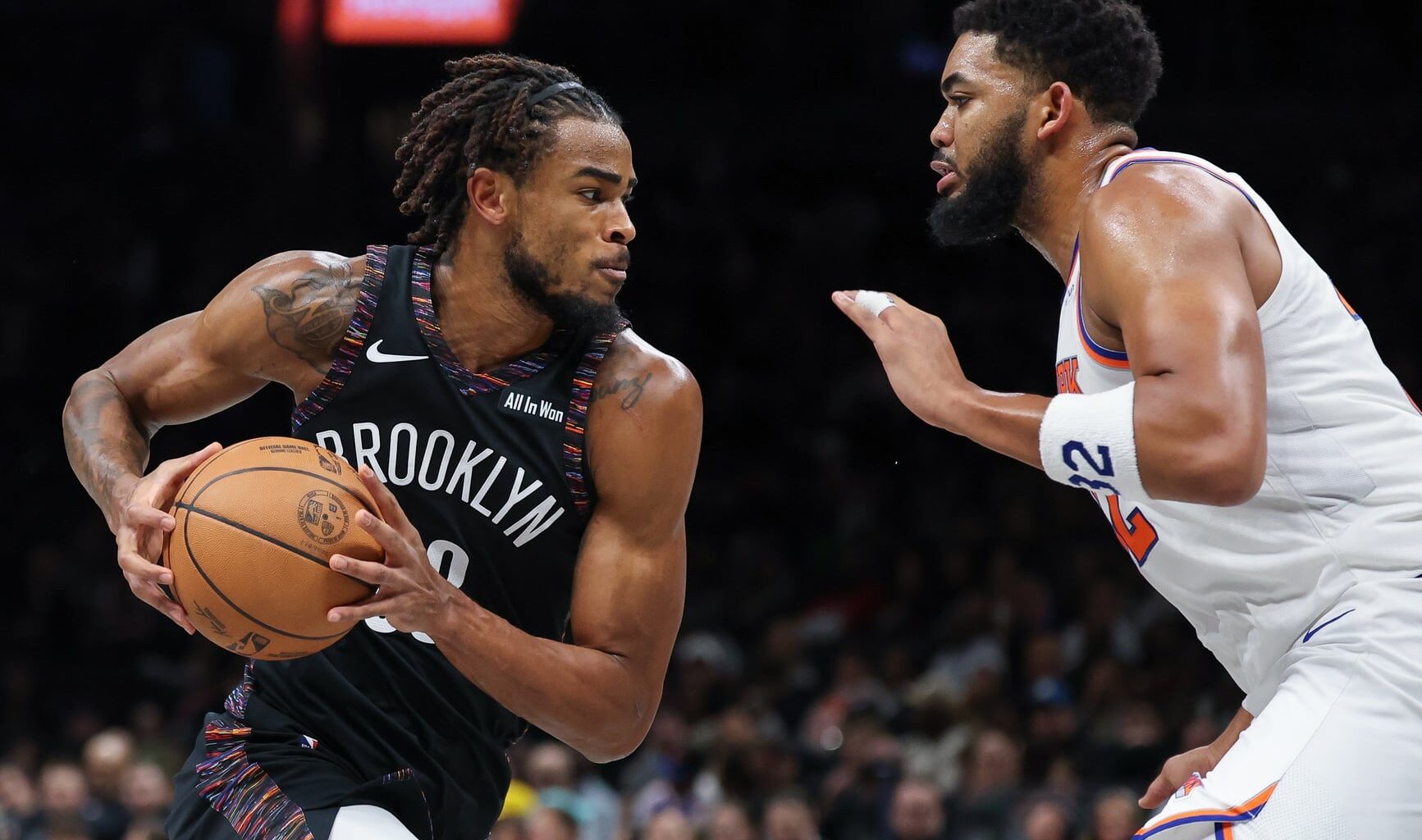 Brooklyn Nets center Nic Claxton (33) is guarded by New York Knicks center Karl-Anthony Towns (32) during the second half at Barclays Center.