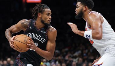 Brooklyn Nets center Nic Claxton (33) is guarded by New York Knicks center Karl-Anthony Towns (32) during the second half at Barclays Center.