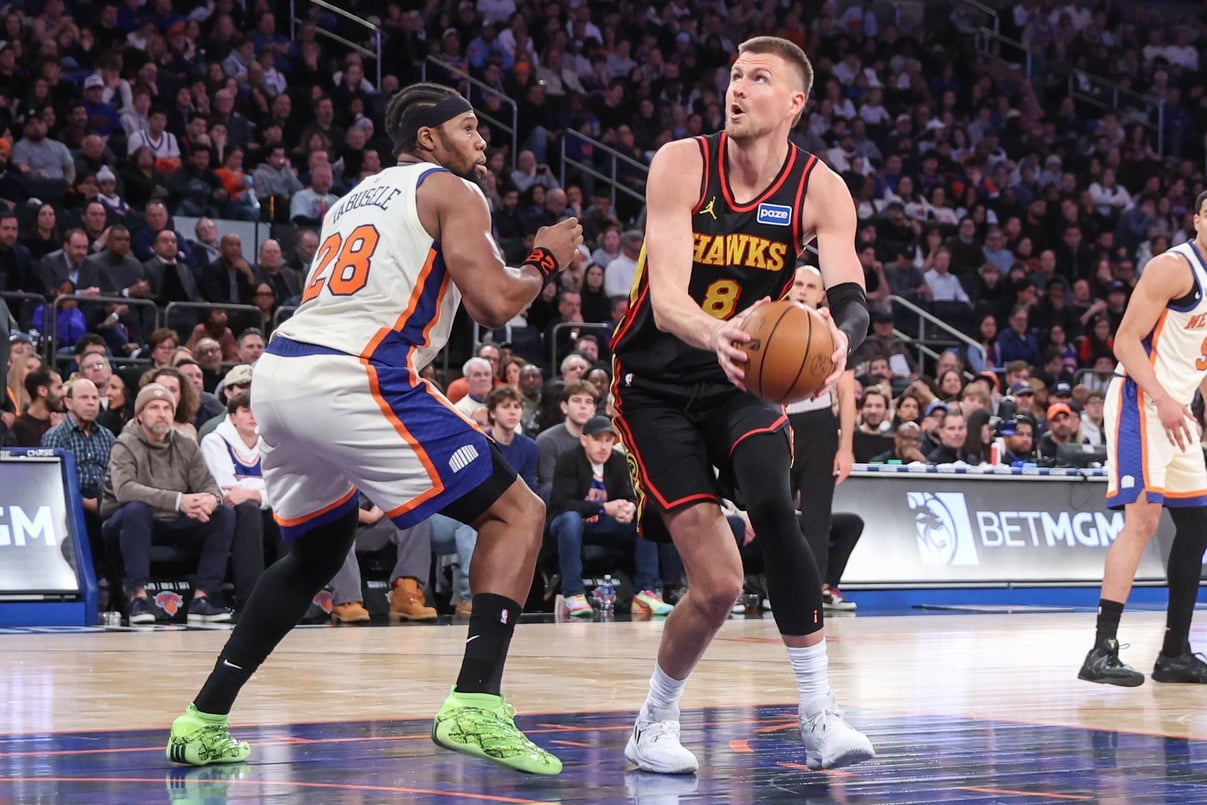 Jan 2, 2026; New York, New York, USA; Atlanta Hawks center Kristaps Porzingis (8) looks to post up against New York Knicks forward Guerschon Yabusele (28) in the third quarter at Madison Square Garden. Mandatory Credit: Wendell Cruz-Imagn Images