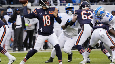 Jan 4, 2026; Chicago, Illinois, USA; Chicago Bears quarterback Caleb Williams (18) passes the ball against the Detroit Lions during the first half at Soldier Field. Mandatory Credit: David Banks-Imagn Images