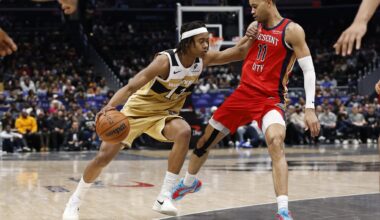 Jan 9, 2026; Washington, District of Columbia, USA; Washington Wizards guard Tre Johnson (12) drives to the basket as New Orleans Pelicans guard Bryce McGowens (11) defends in the second half at Capital One Arena. Mandatory Credit: Geoff Burke-Imagn Images