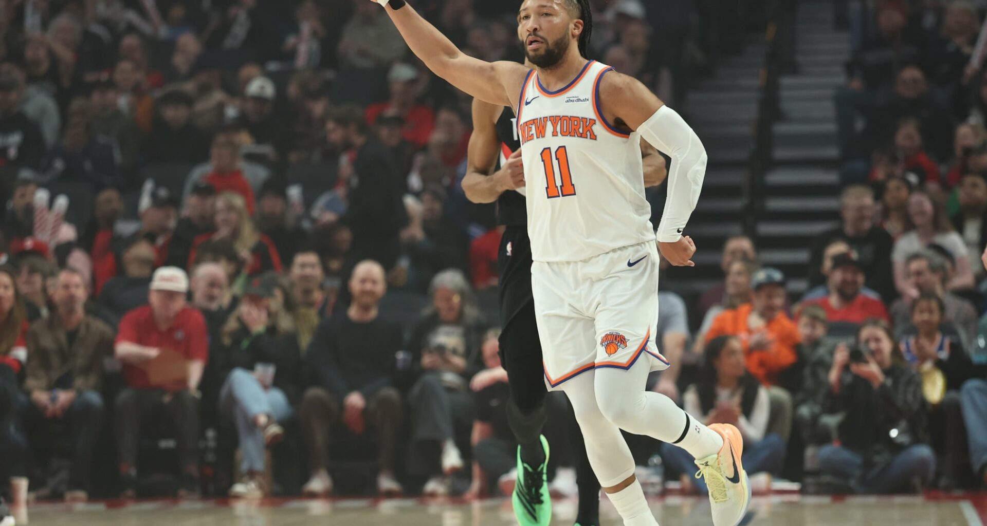 Jan 11, 2026; Portland, Oregon, USA; New York Knicks guard Jalen Brunson (11) reacts after scoring a three-point shot against the Portland Trail Blazers during the first half at Moda Center. Mandatory Credit: Jaime Valdez-Imagn Images
