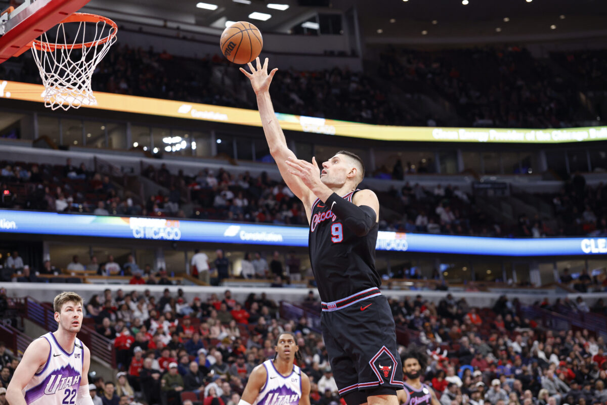 Jan 14, 2026; Chicago, Illinois, USA; Chicago Bulls center Nikola Vucevic (9) shoots against the Utah Jazz during the second half at United Center.