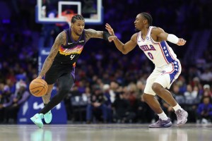 Jan 20, 2026; Philadelphia, Pennsylvania, USA; Phoenix Suns guard Jalen Green (4) controls the ball against Philadelphia 76ers guard Tyrese Maxey (0) during the first quarter at Xfinity Mobile Arena. Mandatory Credit: Bill Streicher-Imagn Images