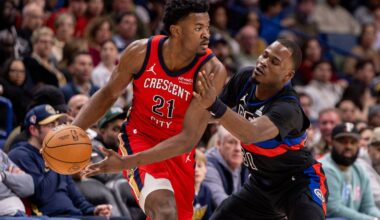 New Orleans Pelicans center Yves Missi (21) dribbles against Detroit Pistons guard Javonte Green (31) during the first half at Smoothie King Center.