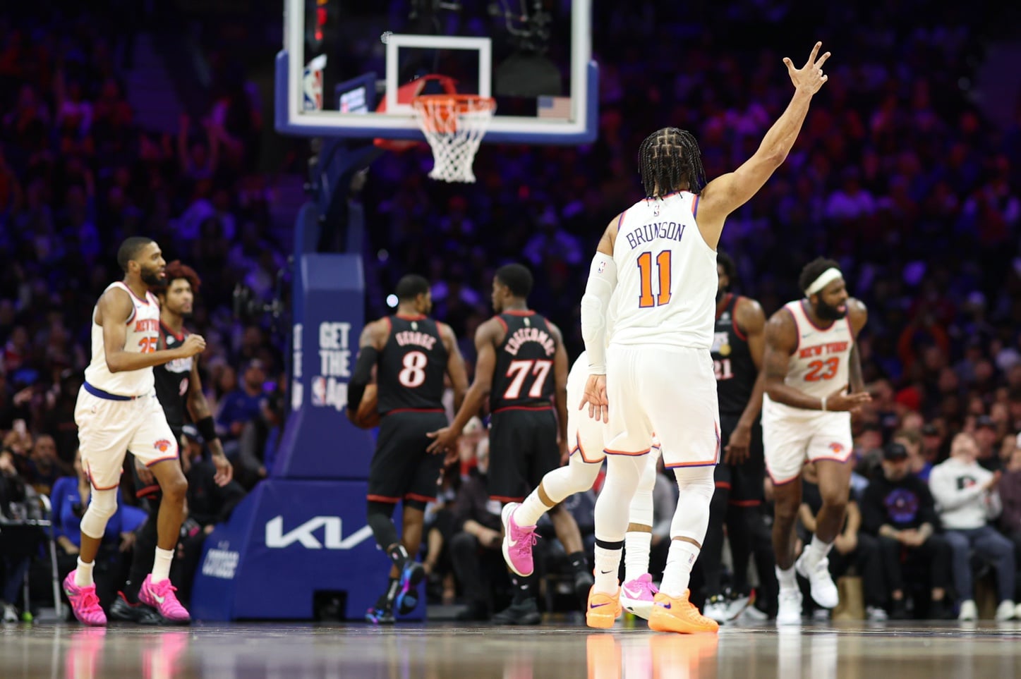 New York Knicks guard Jalen Brunson (11) reacts to his three pointer against the Philadelphia 76ers during the third quarter at Xfinity Mobile Arena.