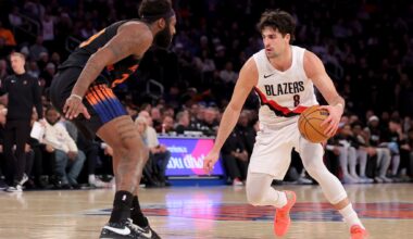 Jan 30, 2026; New York, New York, USA; Portland Trail Blazers forward Deni Avdija (8) controls the ball against New York Knicks center Mitchell Robinson (23) during the fourth quarter at Madison Square Garden. Mandatory Credit: Brad Penner-Imagn Images