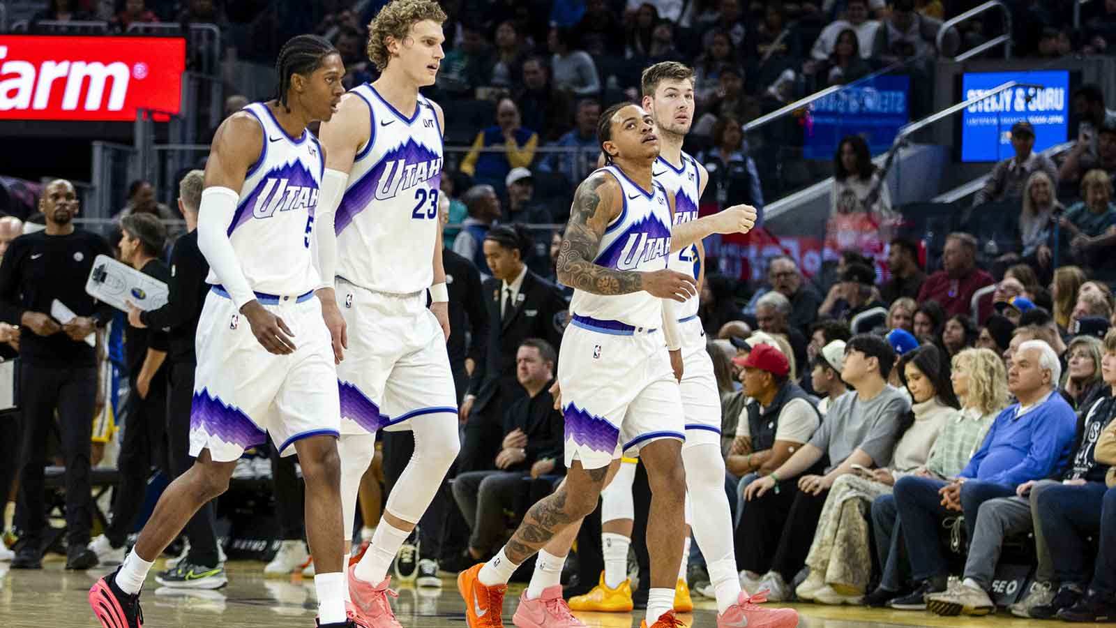 Utah Jazz forward Cody Williams (5) and forward Lauri Markkanen (23) and guard Keyonte George (3) and center Walker Kessler (24) walk off the court during a time out in the second quarter against the Golden State Warriors at Chase Center.