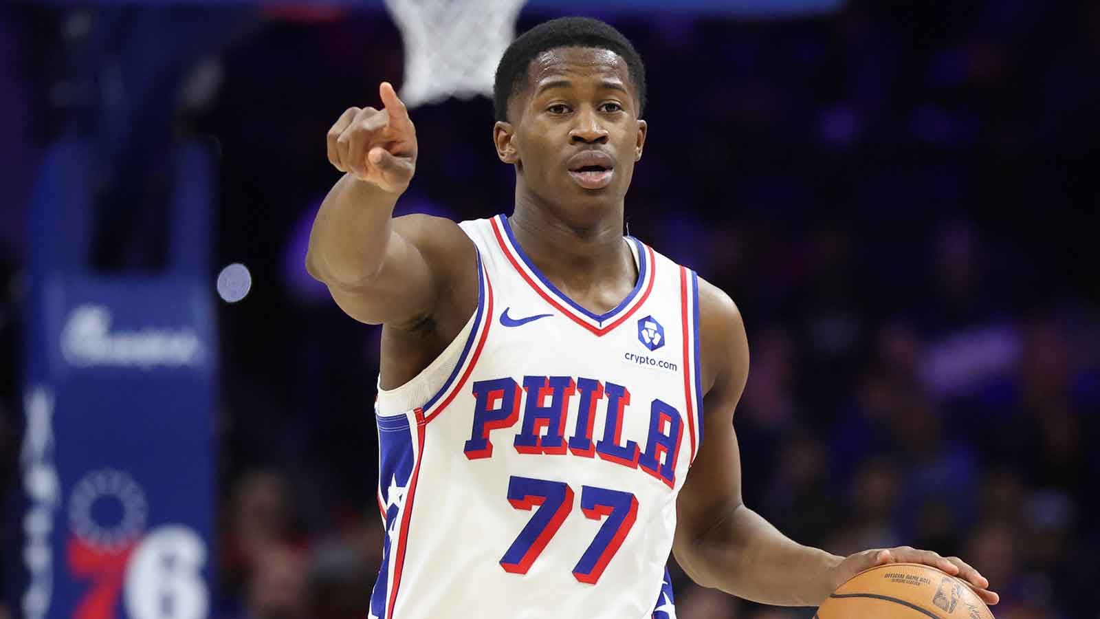 Philadelphia 76ers guard Vj Edgecombe (77) brings the ball up court against the Phoenix Suns during the fourth quarter at Xfinity Mobile Arena.