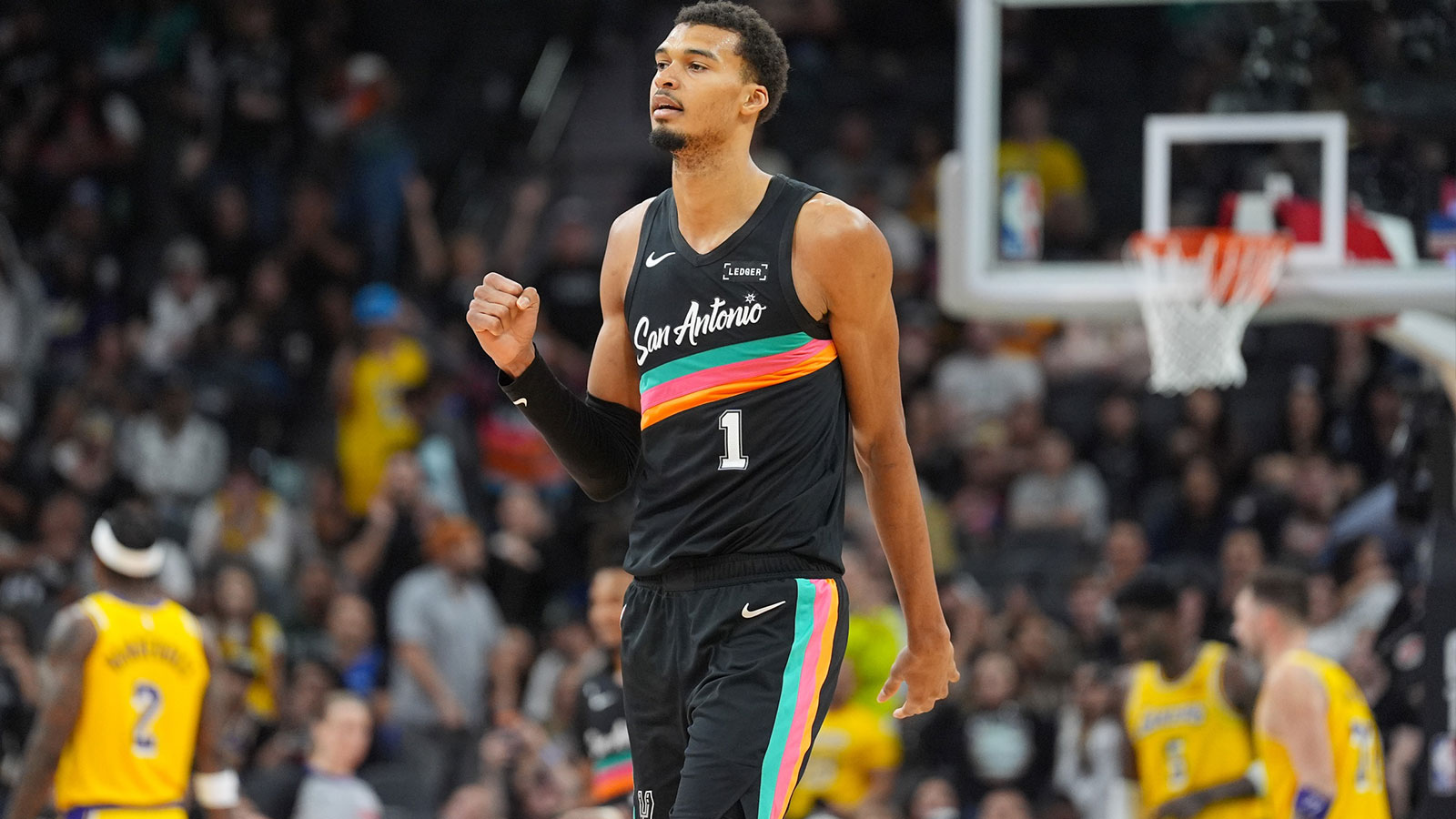 San Antonio Spurs forward/center Victor Wembanyama (1) celebrates in the second half against the Los Angeles Lakers at Frost Bank Center.