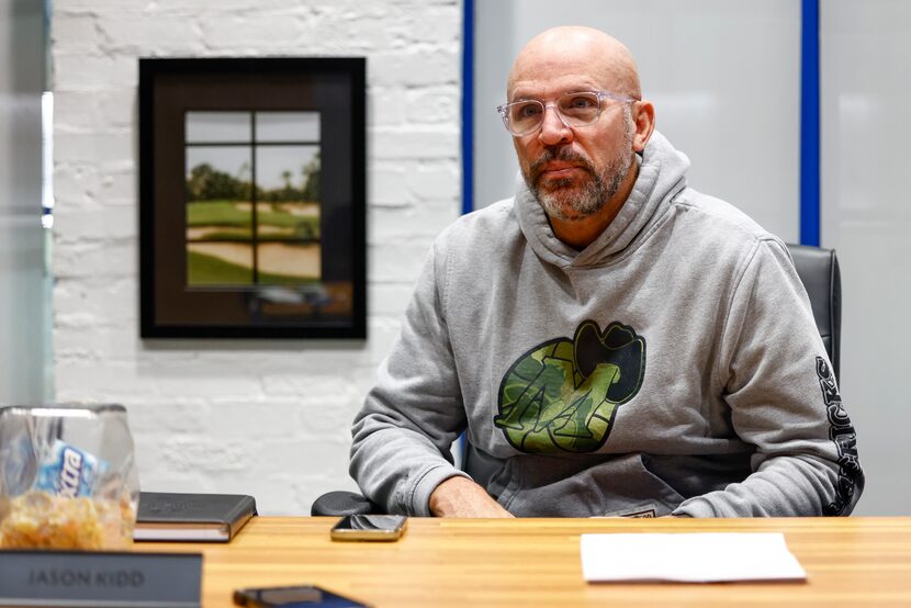 Dallas Mavericks head coach Jason Kidd listens to a question from Dallas Morning News...