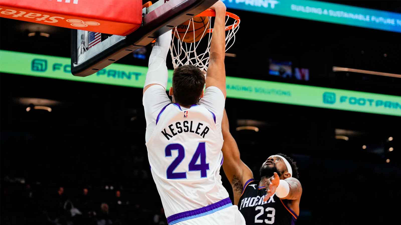 Utah Jazz center Walker Kessler (24) dunks in the first half between the Phoenix Suns and the Utah Jazz at Mortgage Matchup Center. 