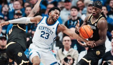 UConn Huskies guard Silas Demary Jr. (2) dribbles the ball against Providence Friars guard Jason Edwards (1) during overtime at Amica Mutual Pavilion.