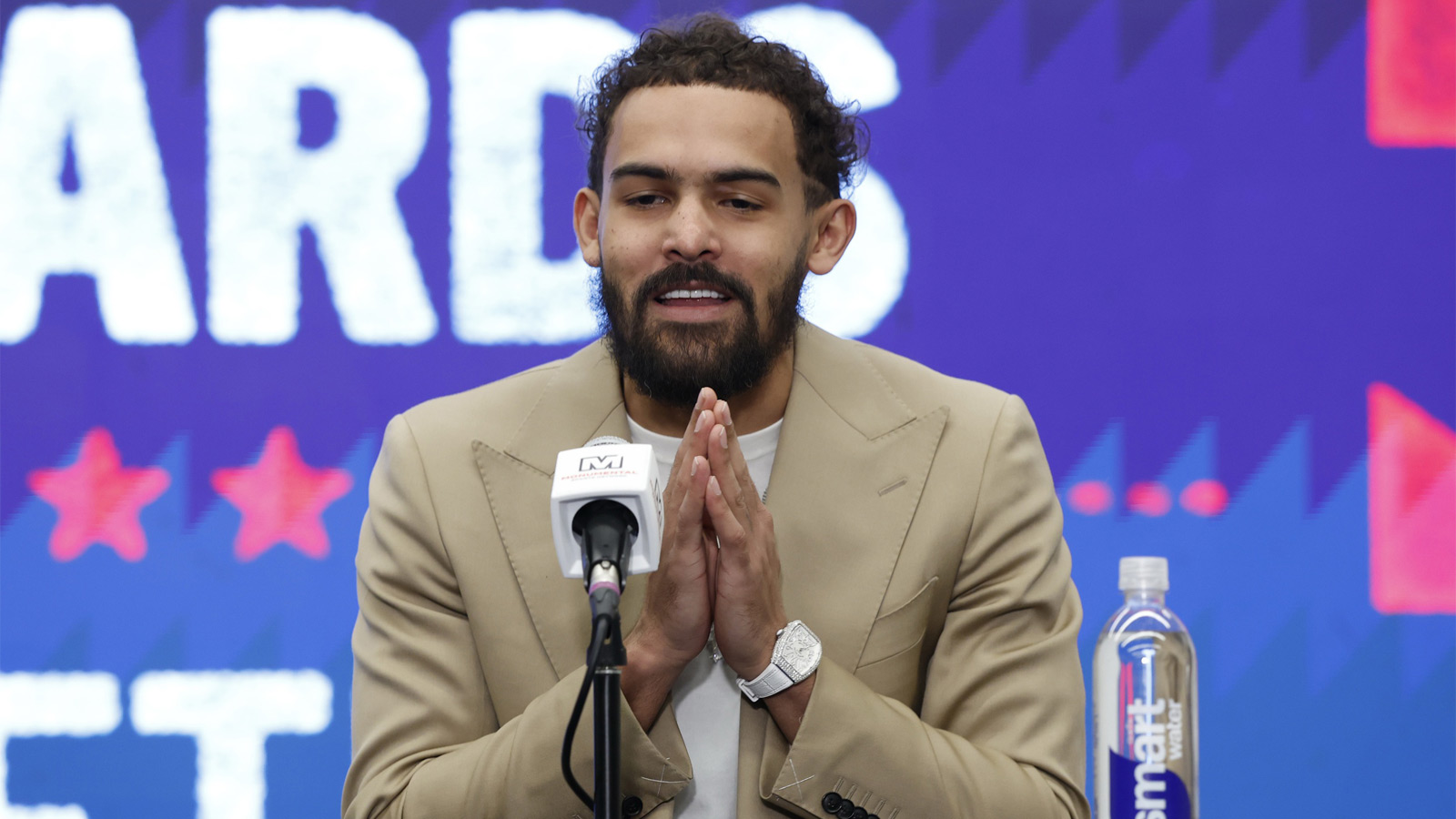 Newly acquired Washington Wizards guard Trae Young speaks at an introductory press conference prior to the Wizards' game against the New Orleans Pelicans at Capital One Arena. 