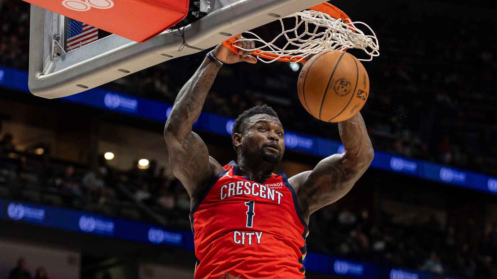 New Orleans Pelicans forward Zion Williamson (1) dunks the ball against Portland Trail Blazers forward Deni Avdija (8) during the second half at Smoothie King Center.
