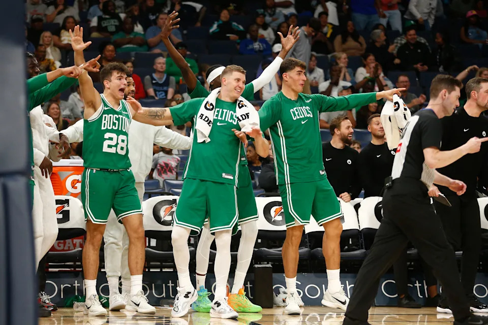 Oct 8, 2025; Memphis, Tennessee, USA; Boston Celtics guard Hugo Gonzalez (28), forward Baylor Scheierman (55) and center Luka Garza (52) react during the second quarter against the Memphis Grizzlies at FedExForum. Mandatory Credit: Petre Thomas-Imagn Images