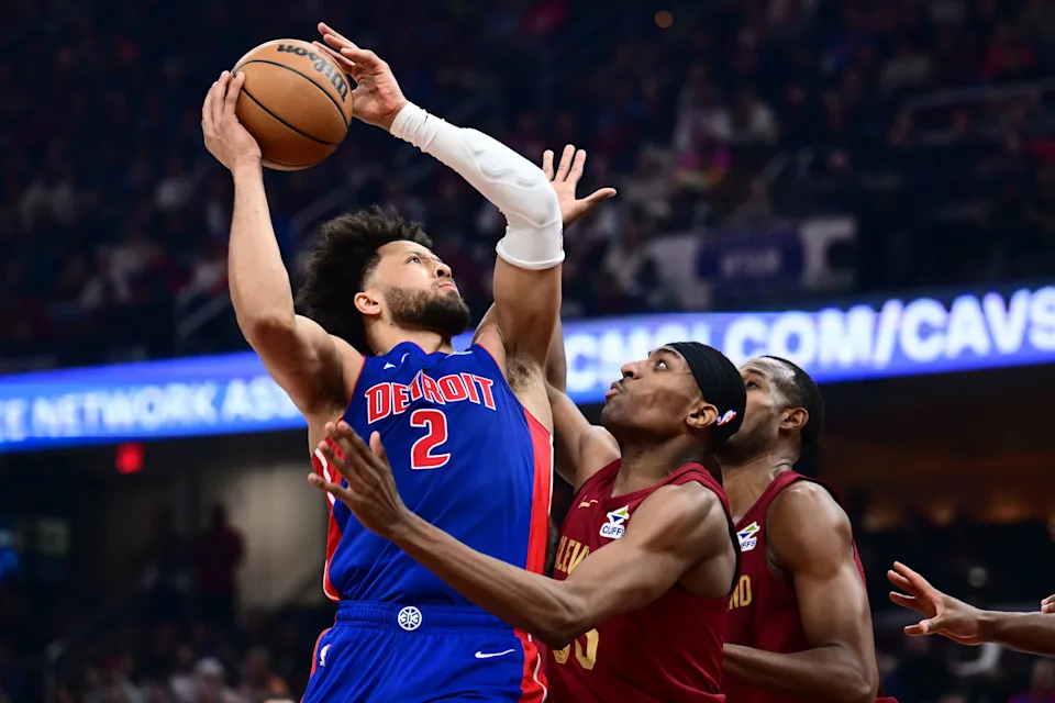 Detroit Pistons guard Cade Cunningham (2) drives to the basket against Cleveland Cavaliers forward Nae'qwan Tomlin (35) on Jan. 4, 2026, in Cleveland.