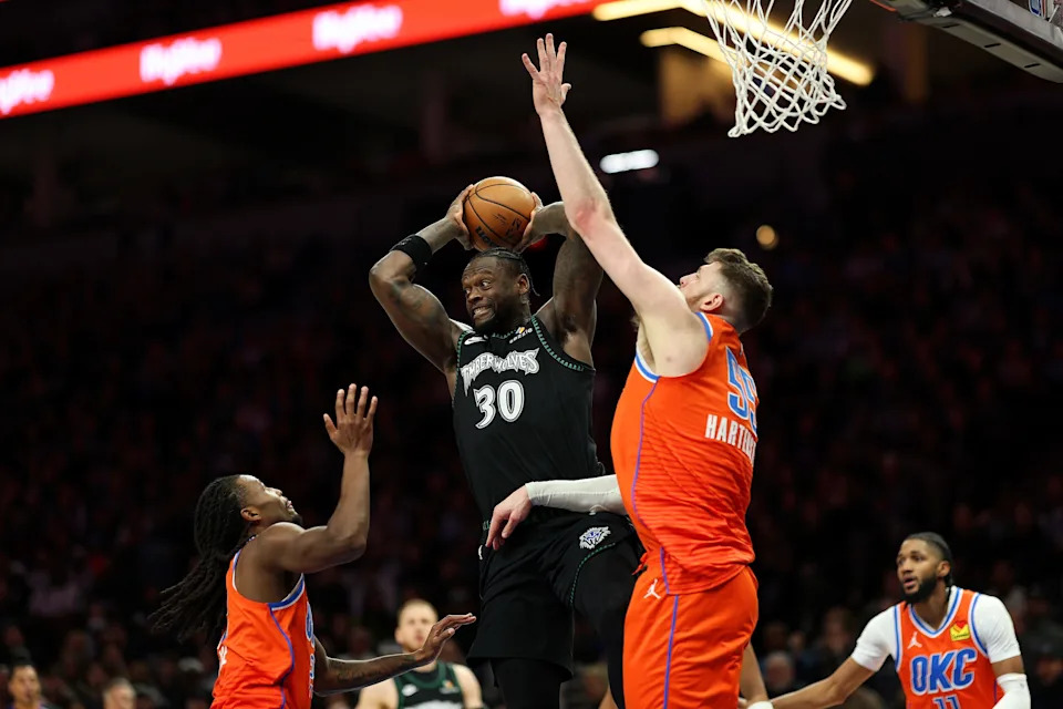 MINNEAPOLIS, MINNESOTA - JANUARY 29: Julius Randle #30 of the Minnesota Timberwolves passes the ball against Isaiah Hartenstein #55 of the Oklahoma City Thunder in the fourth quarter at Target Center on January 29, 2026 in Minneapolis, Minnesota. The Timberwolves defeated the Thunder 123-111. NOTE TO USER: User expressly acknowledges and agrees that, by downloading and or using this photograph, User is consenting to the terms and conditions of the Getty Images License Agreement. (Photo by David Berding/Getty Images)
