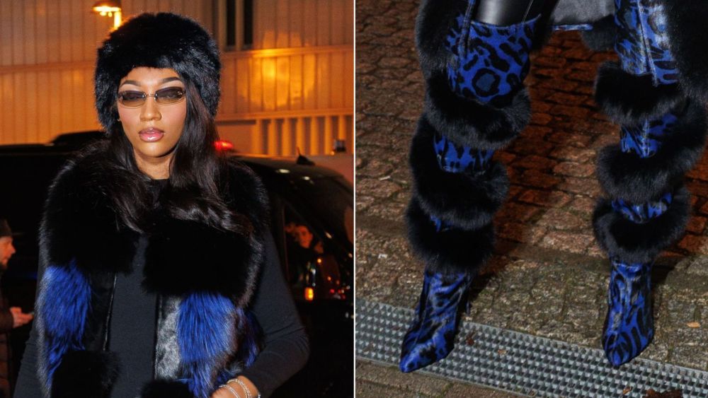 Angel Reese in Jennifer Le Blue Leopard X Fox Thigh-high runway boots by Jennifer Le at the Grizzles vs. Magic NBA game in Berlin on Friday.