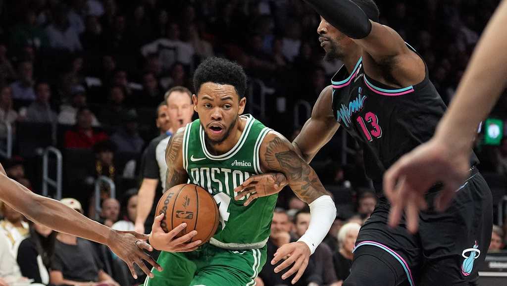 Simons scores 39 points off the bench, as Celtics rally to stun Heat 119-114