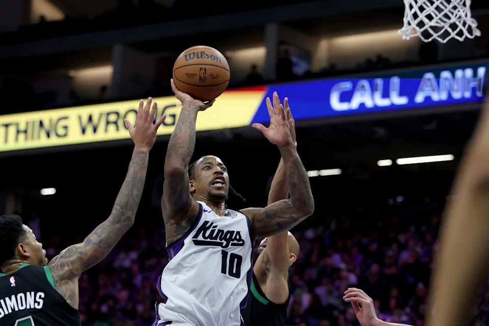Jan 1, 2026; Sacramento, California, USA; Sacramento Kings forward DeMar DeRozan (10) goes up for a basket against the Boston Celtics during the fourth quarter at Golden 1 Center. Mandatory Credit: Dennis Lee-Imagn Images