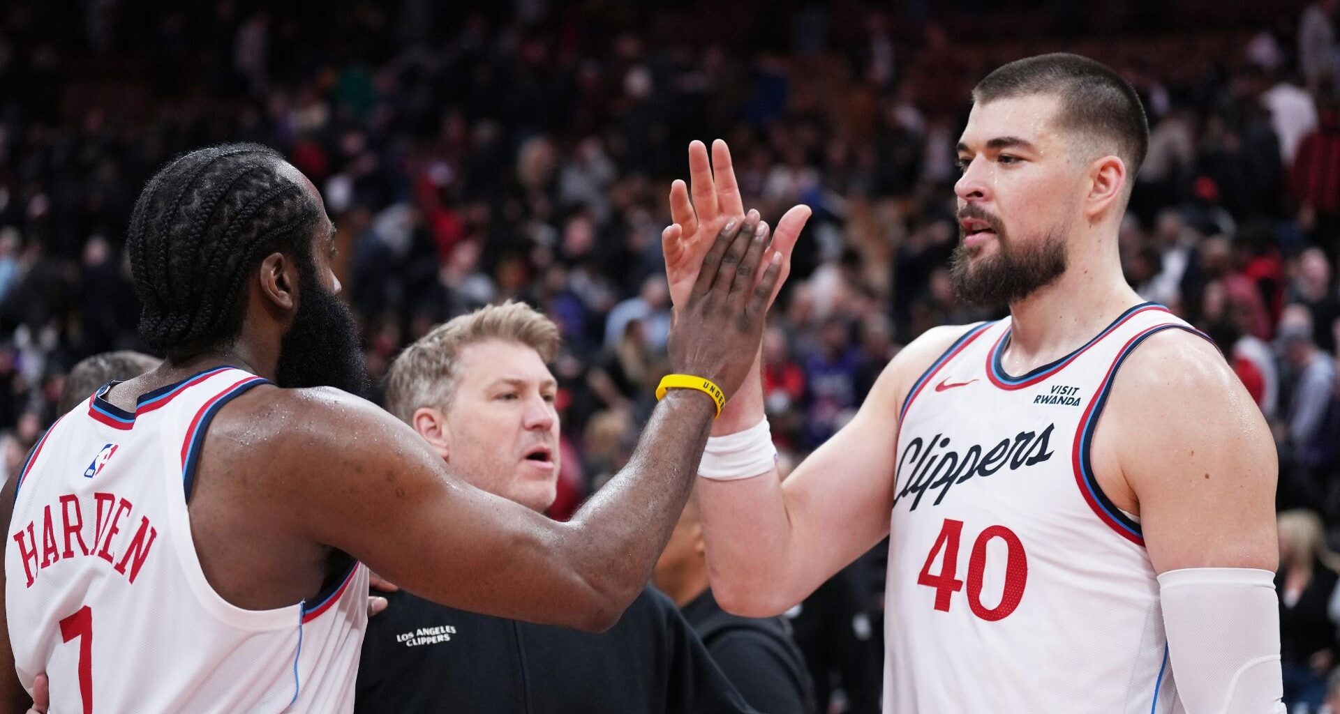 LA Clippers guard James Harden (1) walks on the court against the Golden State Warriors during the first quarter at Chase Center