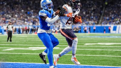 Chicago Bears wide receiver Rome Odunze (15) makes a catch for a touchdown against Detroit Lions safety Kerby Joseph (31) during the first half at Ford Field in Detroit on Sunday, Sept. 14, 2025.