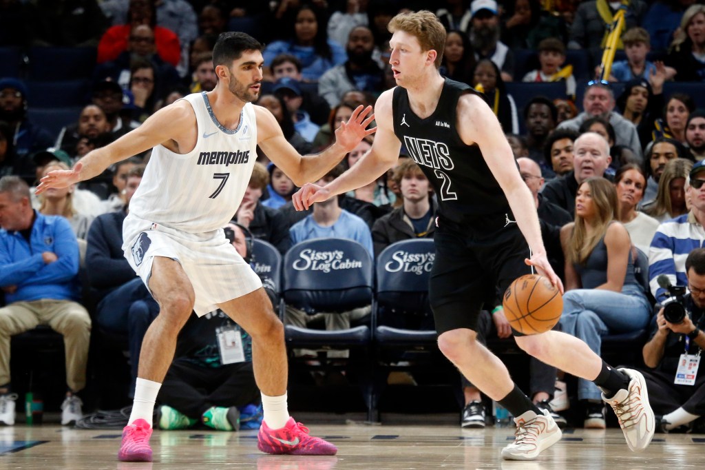 Brooklyn Nets forward Danny Wolf (2) dribbles as Memphis Grizzlies forward Santi Aldama (7) defends during the second quarter at FedExForum. 