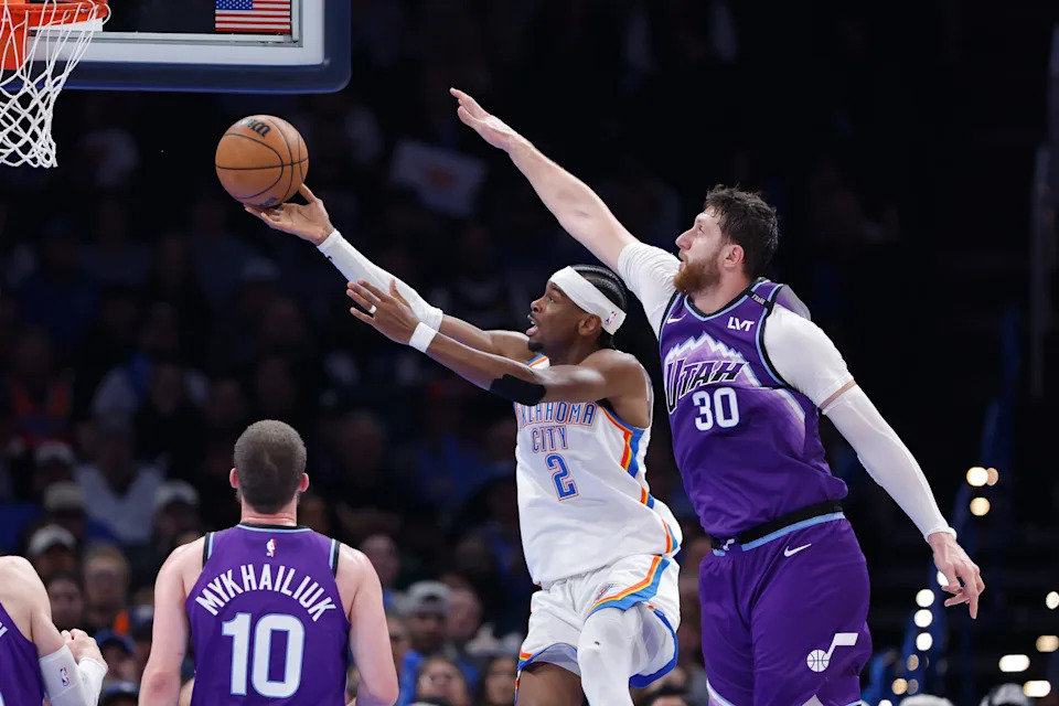 Jan 7, 2026; Oklahoma City, Oklahoma, USA; Oklahoma City Thunder guard Shai Gilgeous-Alexander (2) goes up for a basket in front of Utah Jazz center Jusuf Nurkić (30) during the second half at Paycom Center. Mandatory Credit: Alonzo Adams-Imagn Images