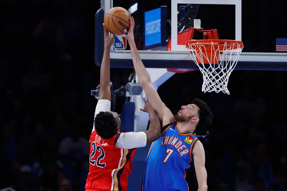 Jan 27, 2026; Oklahoma City, Oklahoma, USA; Oklahoma City Thunder center/forward Chet Holmgren (7) blocks a shot by New Orleans Pelicans center Derik Queen (22) during the second half at Paycom Center. Mandatory Credit: Alonzo Adams-Imagn Images