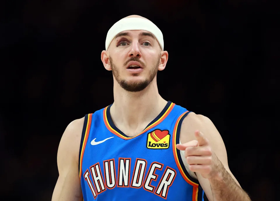 Jan 4, 2026; Phoenix, Arizona, USA; Oklahoma City Thunder guard Alex Caruso (9) against the Phoenix Suns in the first half at Mortgage Matchup Center. Mandatory Credit: Mark J. Rebilas-Imagn Images