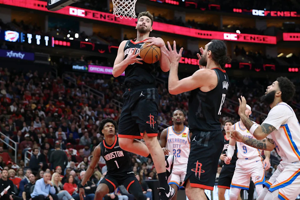 Jan 15, 2026; Houston, Texas, USA; Houston Rockets center Alperen Sengun (28) grabs a rebound during the third quarter against the Oklahoma City Thunder at Toyota Center. Mandatory Credit: Troy Taormina-Imagn Images