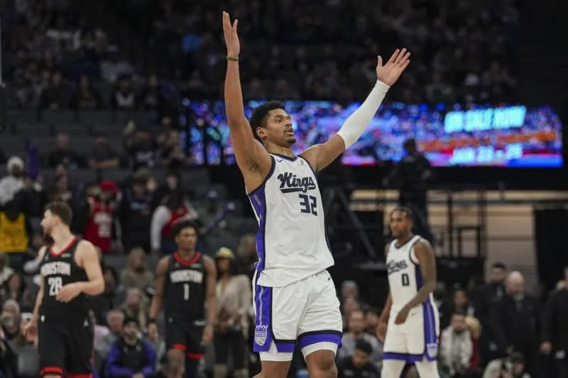 Jan 11, 2026; Sacramento, California, USA; Sacramento Kings center Dylan Cardwell (32) hypes up the crowd during the fourth quarter against the Houston Rockets at Golden 1 Center. Mandatory Credit: Justine Willard-Imagn Images