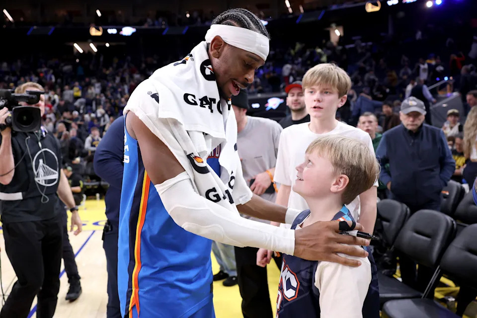 SAN FRANCISCO, CALIFORNIA - JANUARY 02: Shai Gilgeous-Alexander #2 of the Oklahoma City Thunder signs autographs after their game against the Golden State Warriors at Chase Center on January 02, 2026 in San Francisco, California. NOTE TO USER: User expressly acknowledges and agrees that, by downloading and/or using this photograph, user is consenting to the terms and conditions of the Getty Images License Agreement. (Photo by Ezra Shaw/Getty Images)