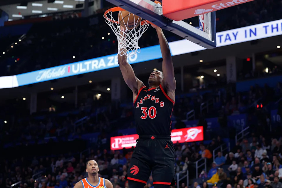 Jan 25, 2026; Oklahoma City, Oklahoma, USA; Toronto Raptors guard Ochai Agbaji (30) dunks against the Oklahoma City Thunder during the second half at Paycom Center. Mandatory Credit: Alonzo Adams-Imagn Images