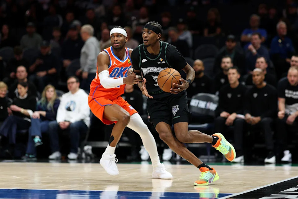MINNEAPOLIS, MINNESOTA - JANUARY 29: Jaden McDaniels #3 of the Minnesota Timberwolves drives to the basket against Shai Gilgeous-Alexander #2 of the Oklahoma City Thunder in the third quarter at Target Center on January 29, 2026 in Minneapolis, Minnesota. The Timberwolves defeated the Thunder 123-111. NOTE TO USER: User expressly acknowledges and agrees that, by downloading and or using this photograph, User is consenting to the terms and conditions of the Getty Images License Agreement. (Photo by David Berding/Getty Images)