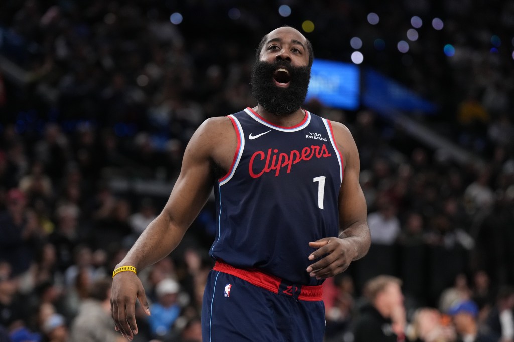 Los Angeles Clippers guard James Harden celebrates his three-point basket.