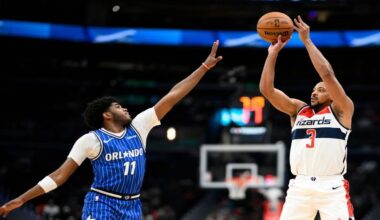 Washington Wizards guard CJ McCollum (3) shoots against Orlando Magic guard Jase Richardson (11) Washington Wizards guard CJ McCollum (3) during the first half of an NBA basketball game, Tuesday, Jan. 6, 2026, in Washington. (AP Photo/Nick Wass)