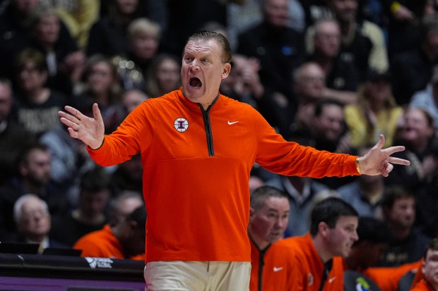 Illinois head coach Brad Underwood gestures during a game against Purdue in West Lafayette, Ind., Saturday, Jan. 24, 2026. (AP Photo/Michael Conroy)